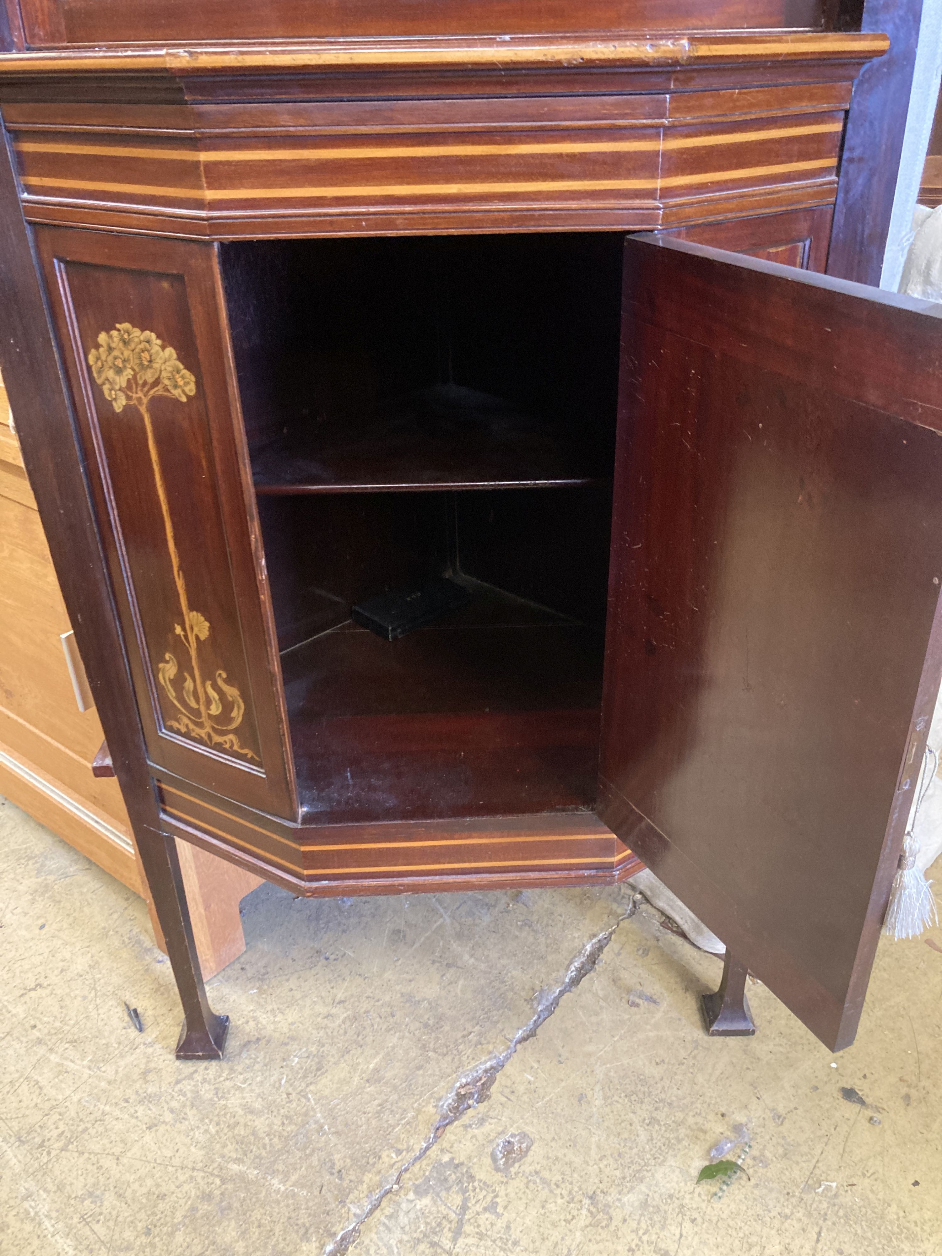 A late Victorian Art Nouveau marquetry inlaid and cross banded mahogany standing corner cabinet, width 74cm, depth 53cm, height 173cm